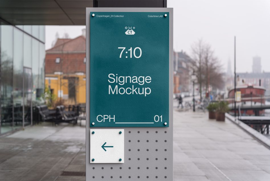 Teal 7:10 signage mockup with white text on urban storefront with pedestrians